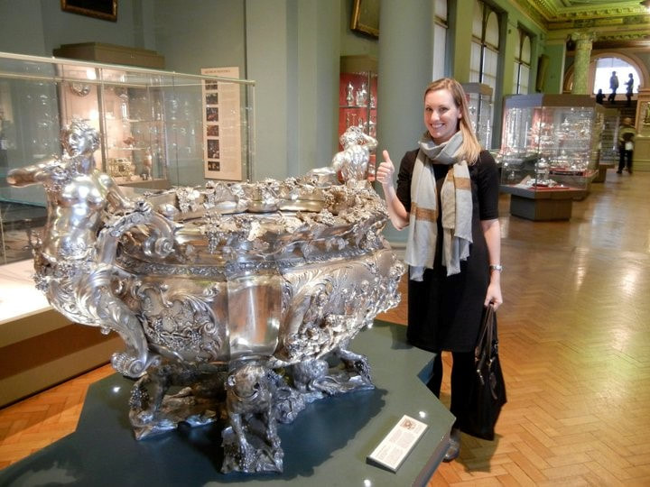 Alice Dickinson with large silver electrotype of the Jerningham Wine Cooler at the Victoria and Albert Museum